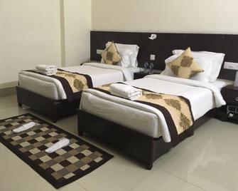Hotel Om Residency - Kushinagar - Habitación