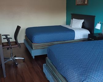Sunrise Inn & Suites New Orleans - New Orleans - Bedroom