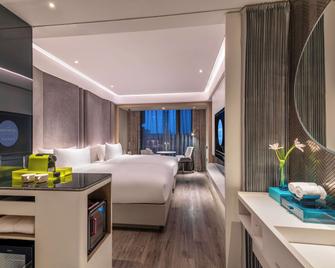 Novotel Yangzhou City Center - Jang-čou - Ložnice