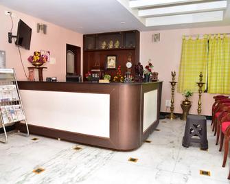 Mohan residency - Hoskote - Front desk