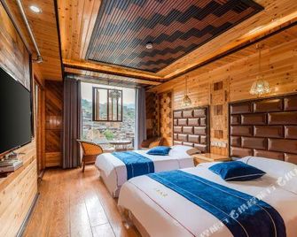 Xijiang Miao Village Homestay Vacation Apartment (Xijiang Qianhu Miao Village Viewing Platform) - Qiandongnán - Habitación