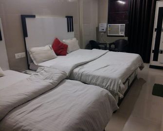Hotel Shiva palace at mayapur road haridwar - Харідвар - Спальня