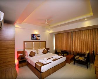 Grand Plaza Suites - Kozhikode - Bedroom