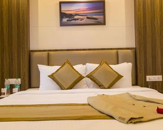 Grand Plaza Suites - Kozhikode - Bedroom