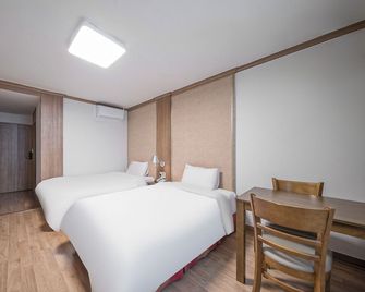 Changwon Olympic Hotel - Changwon - Bedroom