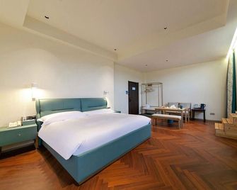 Xiamen Airlines Hotel Chongyangxi Villa - Shangrao - Bedroom