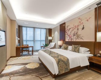Rezen Hotel Changxing Oriental Pearl - Huzhou - Bedroom