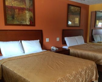 Select Inn & Suites Houston - Houston - Habitación