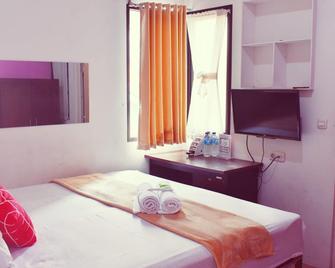 Griya Rattu Kost N Guesthouse - Semarang - Habitación
