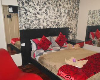 هوستال كريدمي - كويتو - غرفة نوم