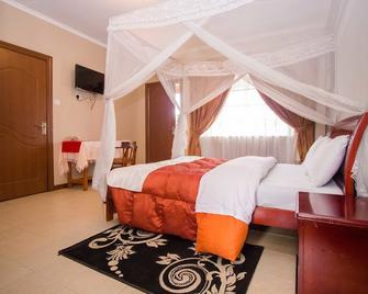 ذا ستاند ليجر هوتل - نايروبي - غرفة نوم