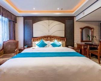 Red Leaf Hotel - Hanzhong - Bedroom