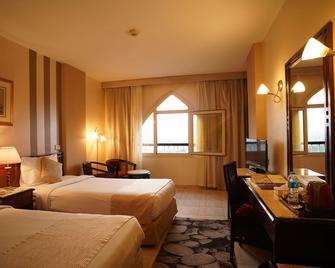 Swiss Inn Nile Hotel - Kairo - Schlafzimmer