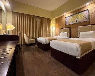 هوتل أو 2 أوكسيجين - كولكاتا - غرفة نوم