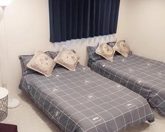 Queen's House - Osaka - Habitación