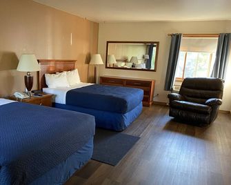 Village Inn on the Lake - Two Rivers - Camera da letto