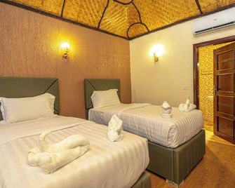 De Rain Eco Beach Resort - Entebbe - Schlafzimmer