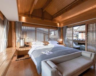 Yunjian Qishe Lanxi | Zen Tea View Holiday Villa Hotel (Lijiang Ancient Town Mufu Branch) - Lijiang - Bedroom