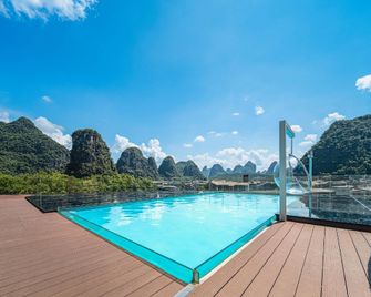 Grand Rezen Hotel Yang Shuo - Guilin - Balkon