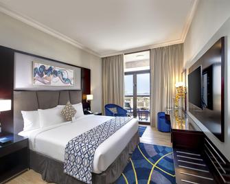 Two Seasons Hotel & Apartments - Dubai - Phòng ngủ