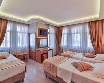 Seymen Hotel - Amasra - Schlafzimmer