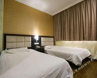 Huakan Business Hotel - Tianjin - Bedroom