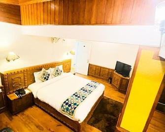 Hotel Sangeet - 西姆拉 - 臥室