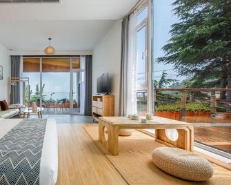Floral Hotel Qingdao Wilderness Homestay Laoshan Beach in Laoshan Scenic Area - Qingdao - Makuuhuone