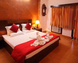 Anand Palace Hotel - אודאיפור - חדר שינה