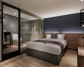 موزيك هوتل - إكسيمن ستيشن برانتش - مدينة تايبيه - غرفة نوم