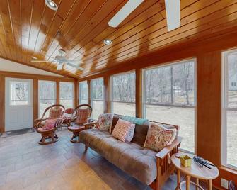 Lakefront home with large yard, firepit, canoe, and fireplace - Plymouth - Living room