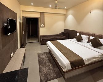 Royal Heritage Inn - Siliguri - Bedroom