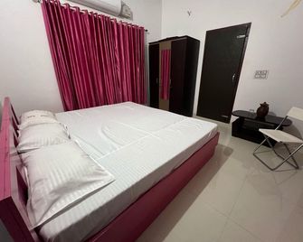 Silent River Homestay - Manipala - Bedroom