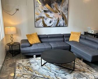 Beautiful Condos walking distance to a private beach! - Tamuning - Living room