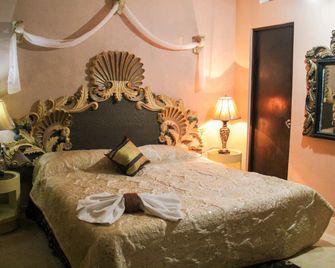 هوتل بالاثيو كانتون - فالادوليد (مكسيكو) - غرفة نوم