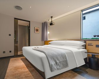 Jiangge Liying Hotel (Changsha Wuyi Square Branch) - Changsha - Bedroom