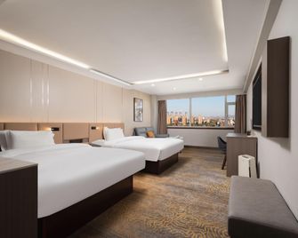 Rose Hotel - Zibo - Schlafzimmer
