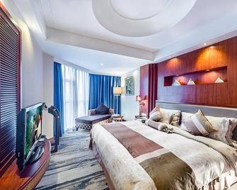 Haikou Mingguang Shengyi Hotel - Haikou - Bedroom