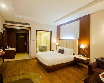 Hotel Madhuban - Dehradun - Camera da letto