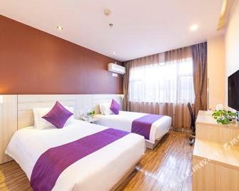 Tiandi Renhe Business Hotel Jinan Quancheng Square - Jinan - Bedroom
