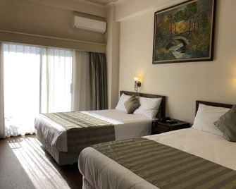 Holiday Saipan Hotel - Garapan - Bedroom