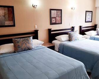 هوتل كاتدرال - توكستلا جوتيريز - غرفة نوم