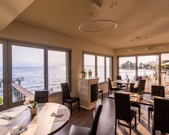 كلوب ديل سولي ديسينزانو بوتيك ريزورت - ديسينزانو ديل غاردا - مطعم