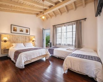 Barbara's Boutique Hostel - אנטיגואה גוואטמלה - חדר שינה