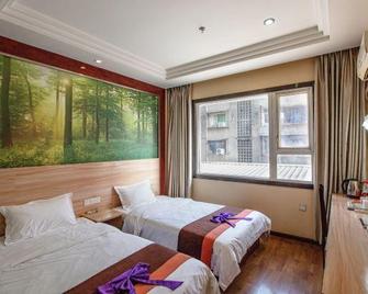 Junyiliansuo Hotel - Suining - Bedroom