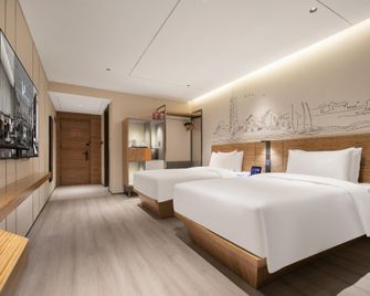 Madison Hotel Anqing Huifeng Wuyue Plaza - Anqing - Chambre