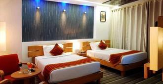 Hotel Onn - Ludhiāna - Yatak Odası