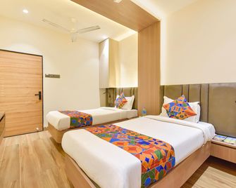 Fabhotel Kesar - Indore - Yatak Odası