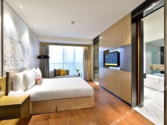 نانجينغ كوينو إن إي كيو تي إيه هوتل - نانجينغ - غرفة نوم