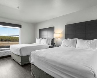 Riverstone Suites by Cobblestone Hotels - Chippewa Falls - Chippewa Falls - Schlafzimmer